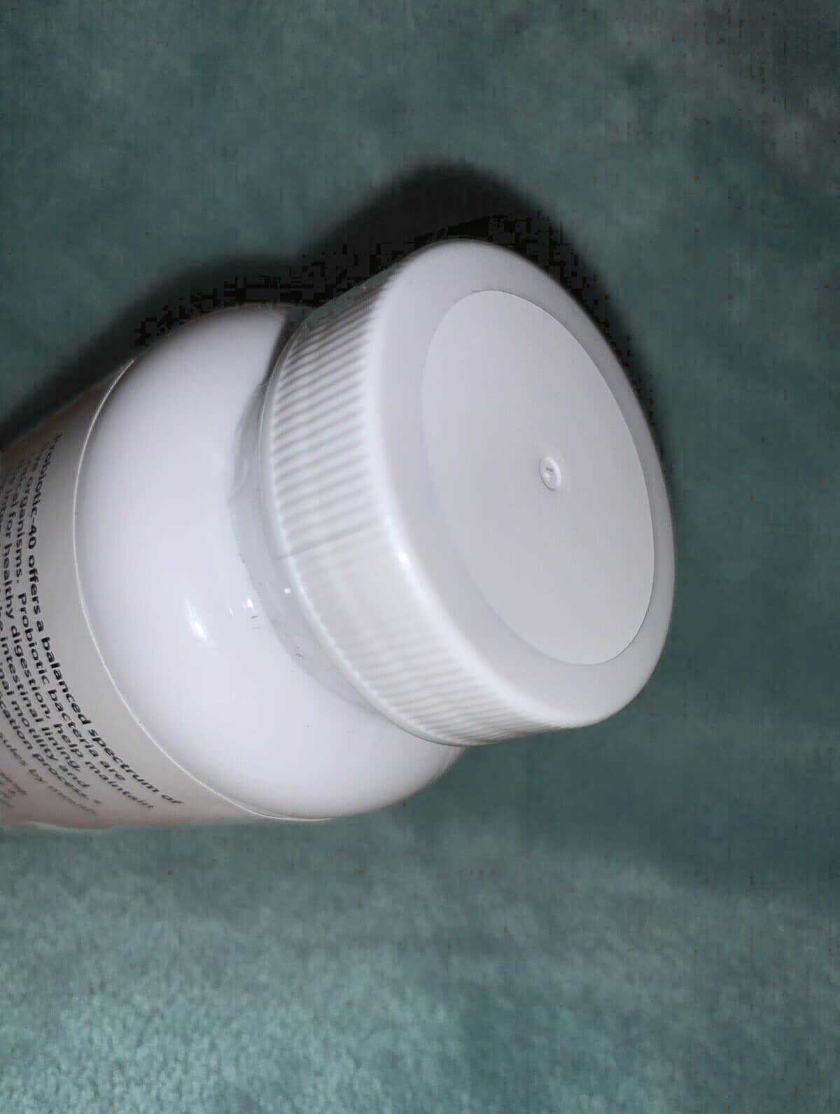 side angle view of Urgent fungus destroyer bottle when unboxed